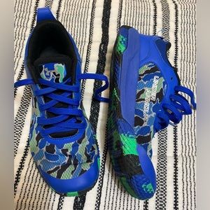 Boys under armour tennis shoes.